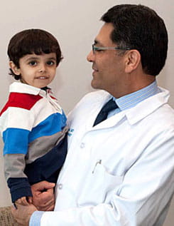 Mohammad, 4, with Dr. Ajay Kaul of Cincinnati Children’s. 
