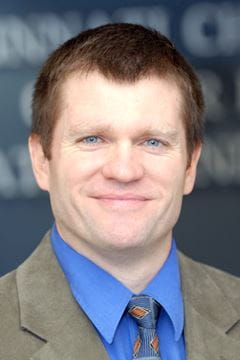 A photo of Gary L. Geis.