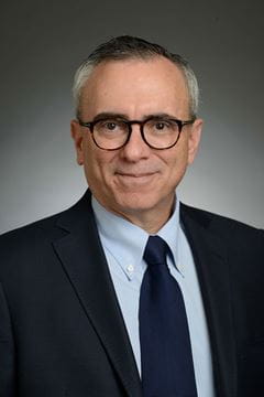 A photo of James M. Greenberg.