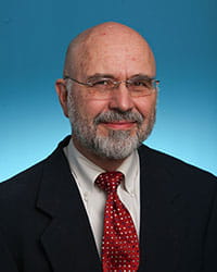 A photo of John Harley, MD, PhD.