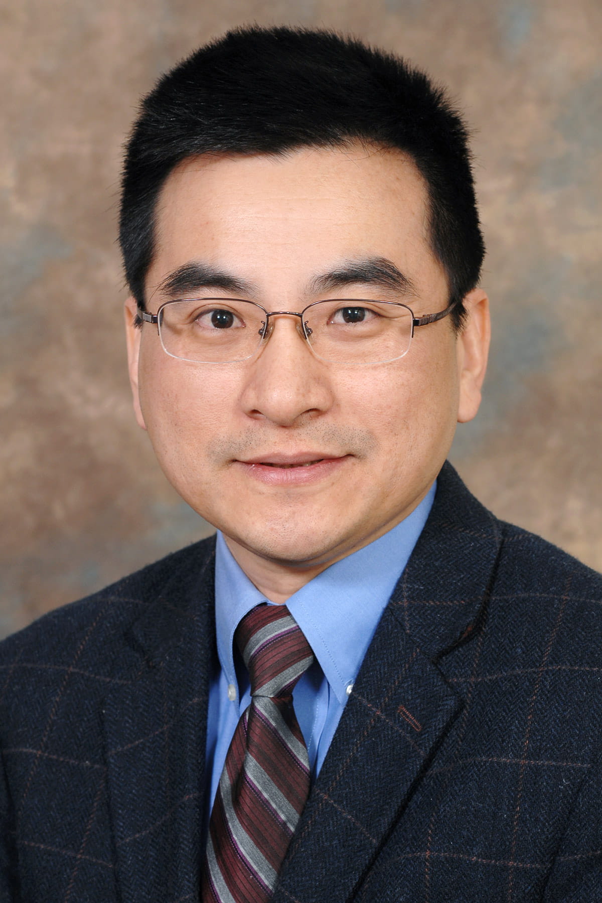 A photo of Shouxiong Huang.