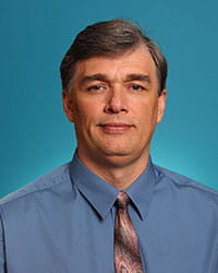 A photo of Vladimir Kalinchenko.