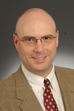A photo of James Leach.