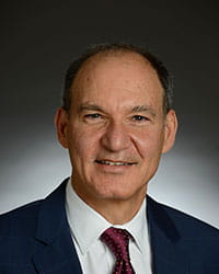 A photo of Peter Margolis. MD, PhD.