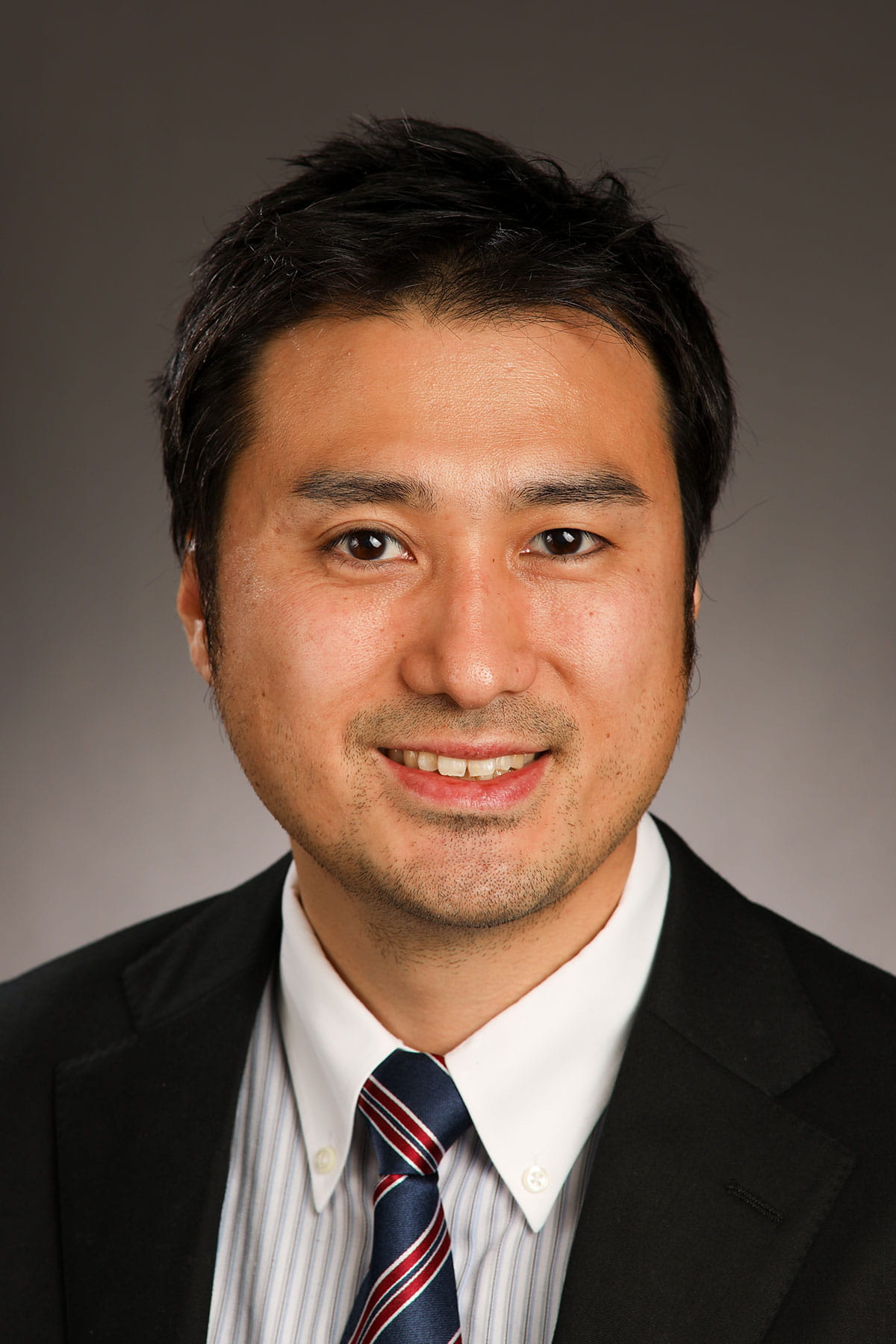 A photo of Tomoyuki Mizuno.