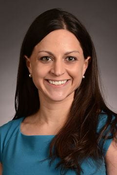 A photo of Tara D. Rhine.