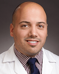 A photo of Christopher Siracusa.