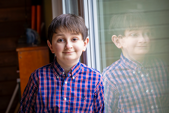 Noah smiles.