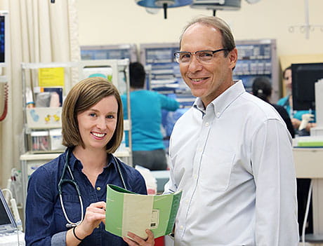 Dr. Erin Hoehn, now a fellow in emergency medicine, with Global Health Residency Track director Dr. Chuck Schubert. 