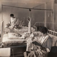 Children in hospital beds.