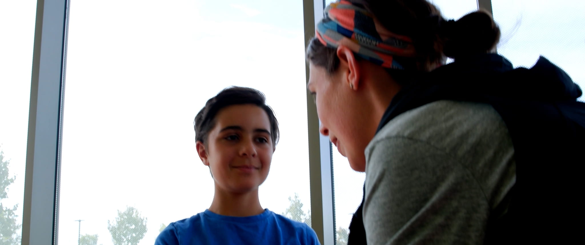 A patient and his provider sit together.