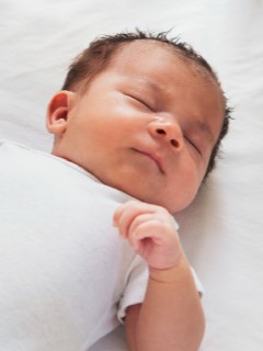 A newborn baby sleeping.