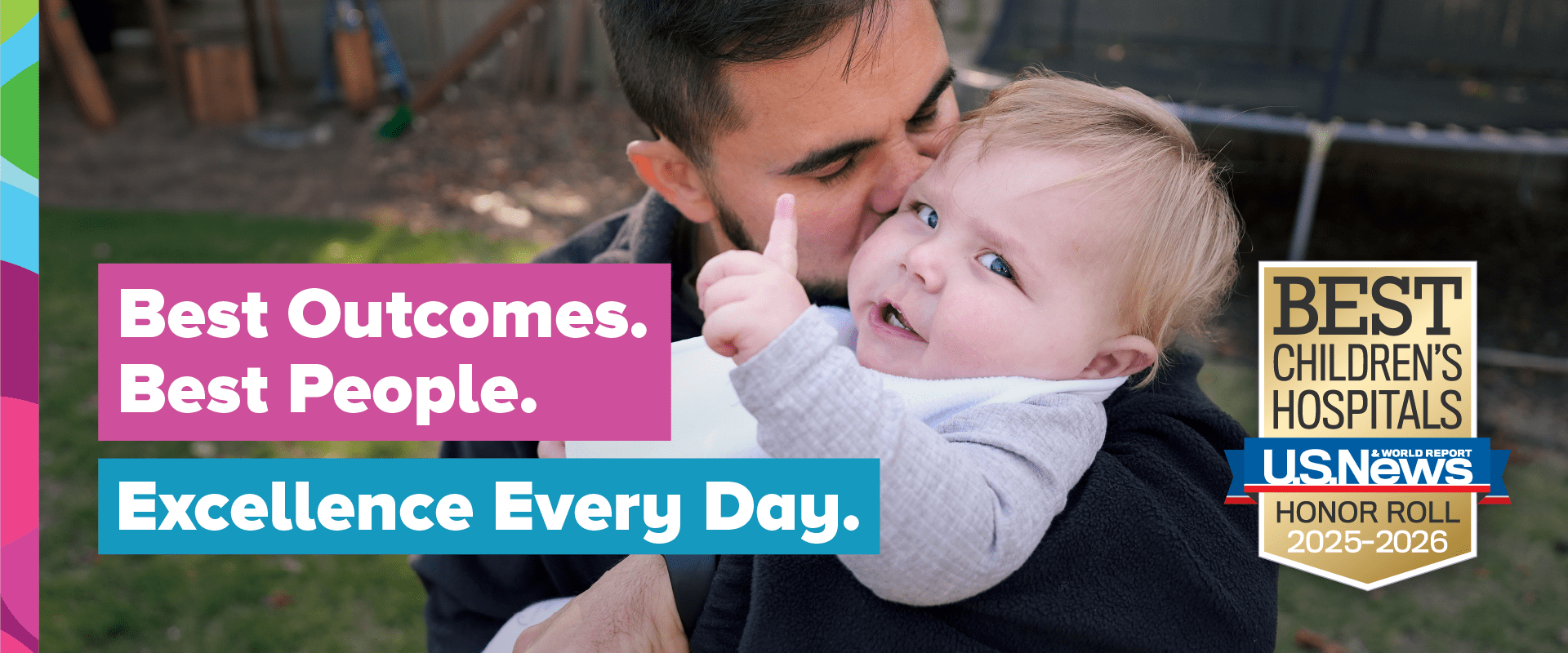A father gives his son a hug and kiss.
