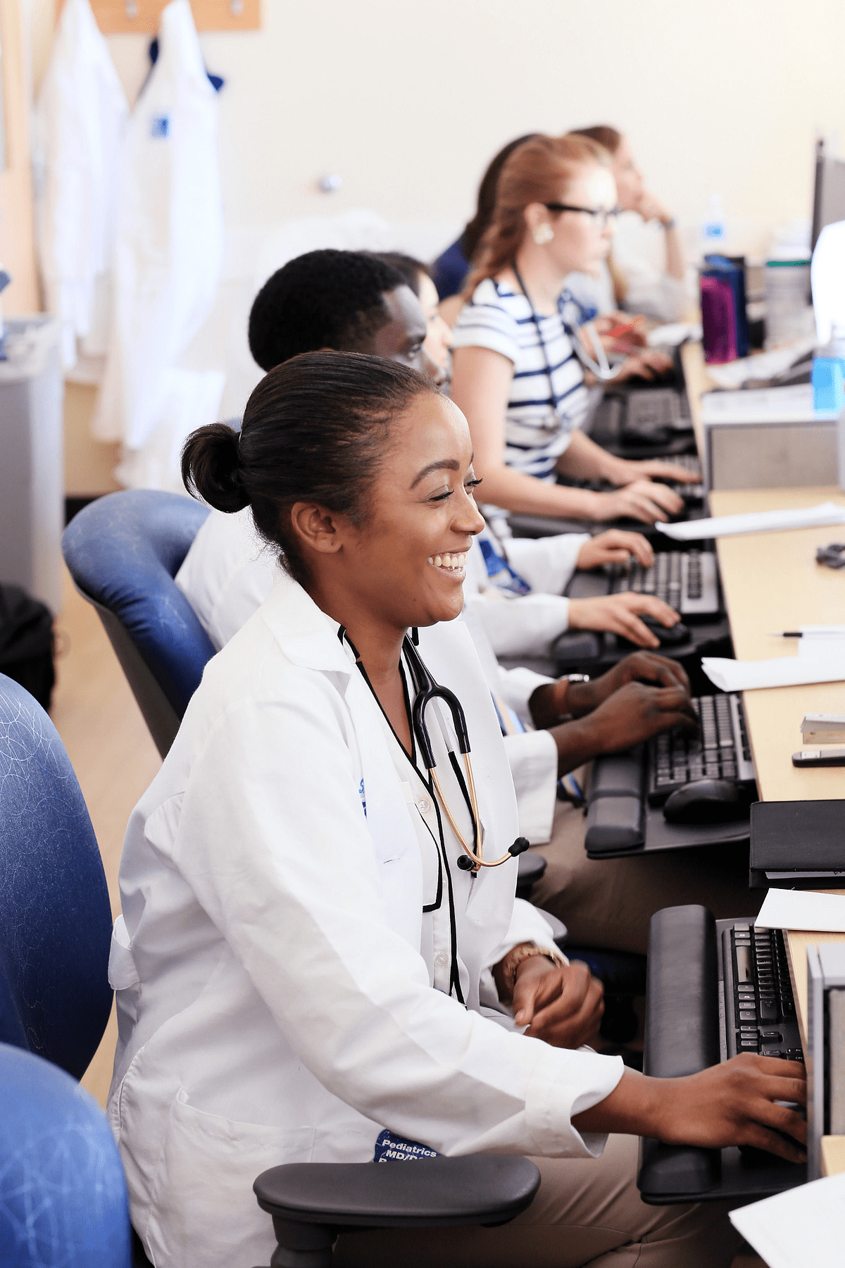 Cincinnati Children's employees working on computers.