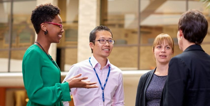 A group of people talking.