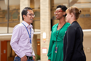 An image of employees talking.