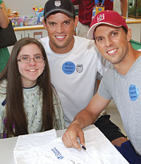 Brooke, a patient in the Cancer and Blood Diseases Institute, met with tennis stars Bob and Mike Bryan during a visit to Cincinnati Children’s.
