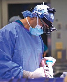 Dr. Mangano performing a surgery. 