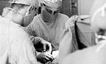 Historical photo of doctors in surgery.