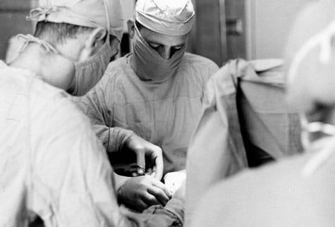 Historical photo of doctors in surgery.
