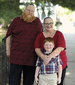 Logan and his parents.