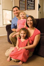 Josh, Nina, Lisa and Ellie Mayers at home in Cleveland.