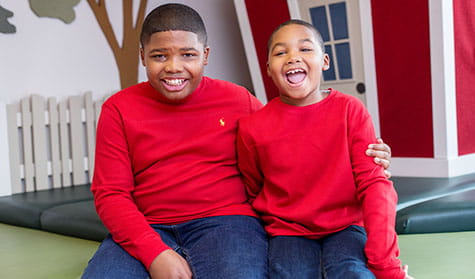 Brothers share a laugh.