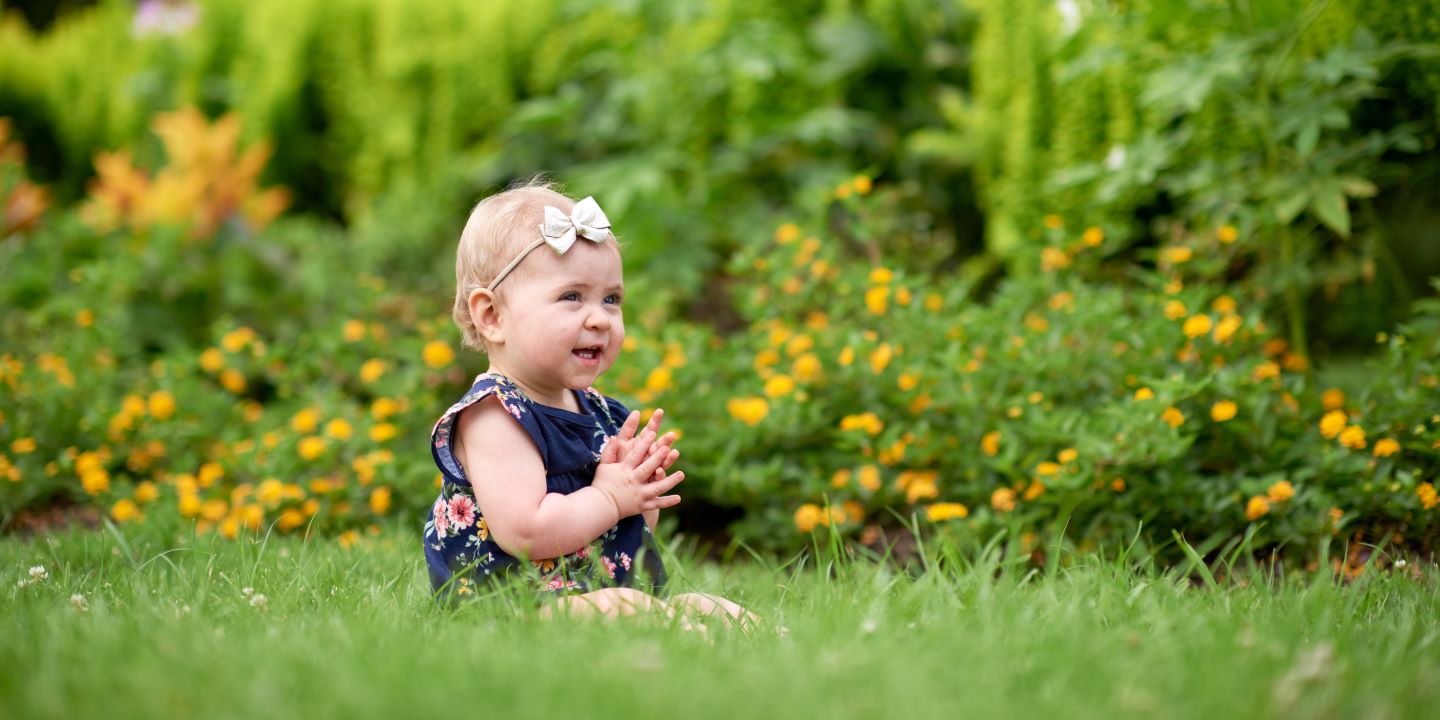 Patient Brynn Schulte poses for photos with her family in French Park.