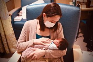 An image of a spina bifida patient and her mother.