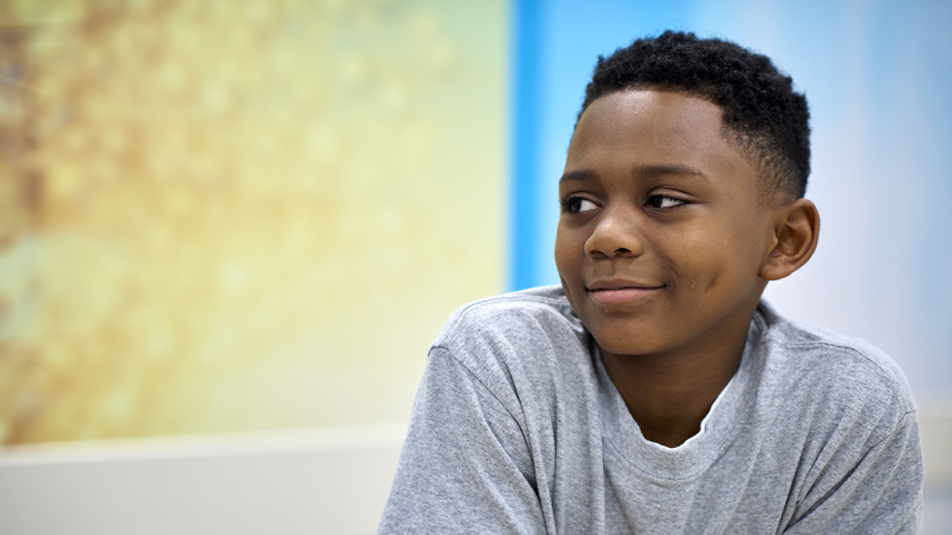 Boy smiling.