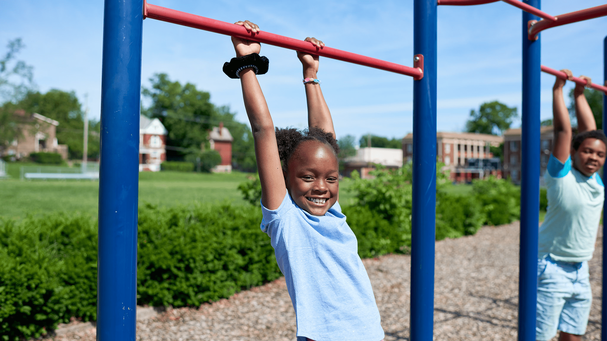 Kids playing on a playground.