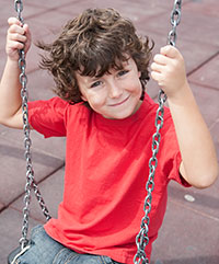 Boy on a swing.