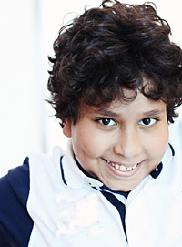 frequently-asked-smiling-boy-200x