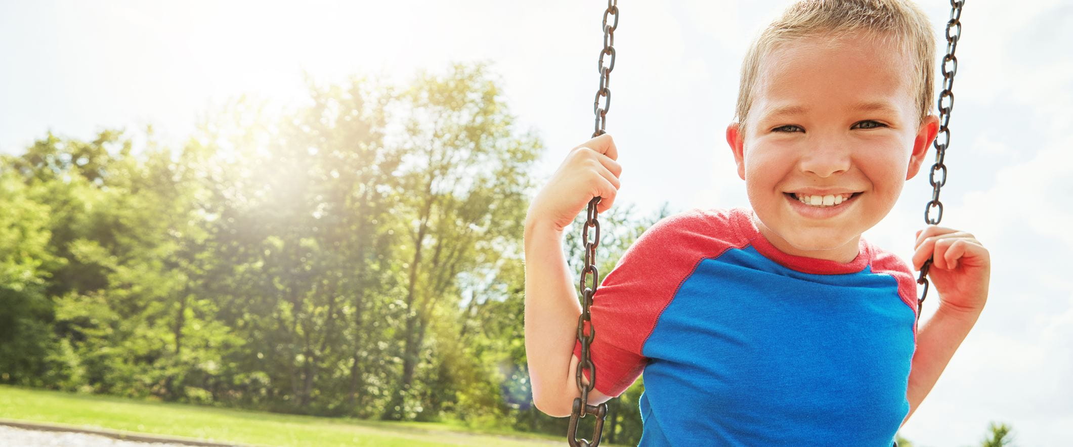 boy swinging
