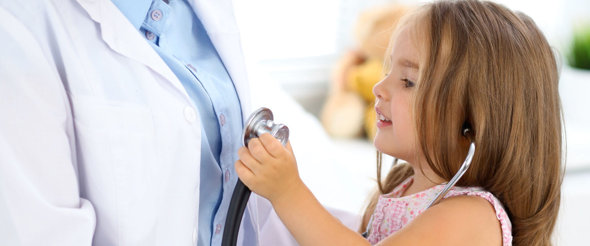 girl playing stethoscope