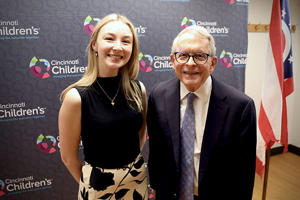 Ohio Gov. Mike DeWine and Claire Blevins, RN, a childhood leukemia survivor.