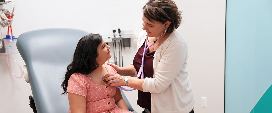 Patient with her provider during a clinic visit.
