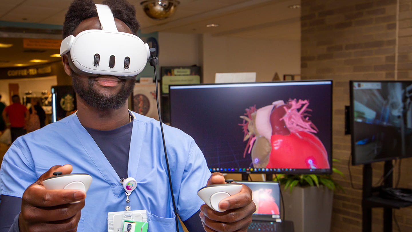Medical student testing virtual reality at Cincinnati Children's.