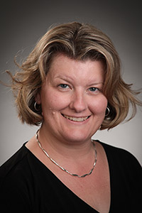 A headshot of Michelle Adams.