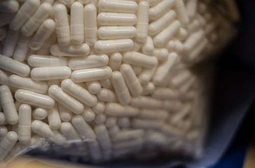 A photo of medicine in a pharmacy.