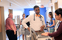 An image of clinical fellows during rounds.