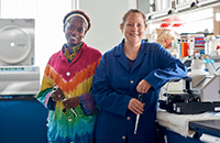 An image of two female researchers working in the lab.