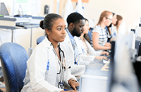 An image of students working in the lab.