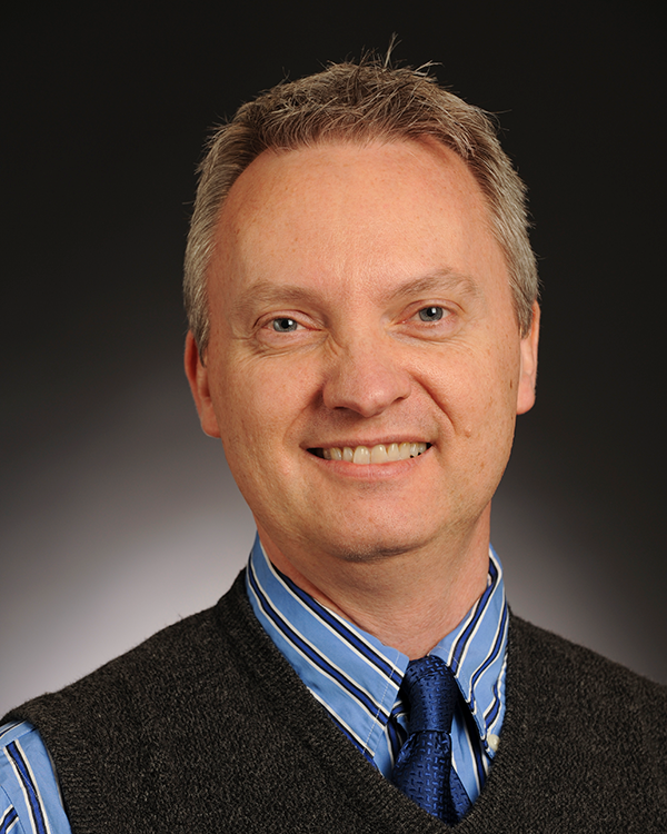 A photo of Michael Henrickson.