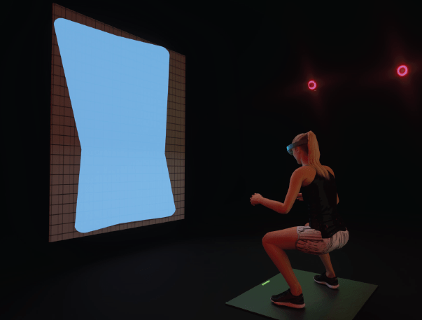 An image of an athlete squatting during the biofeedback study.
