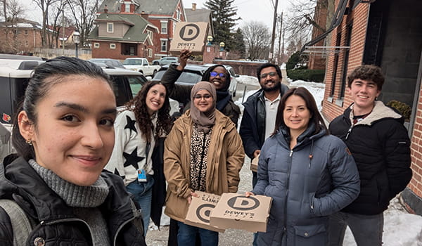 Members of the Azouz Lab on a pizza outing.