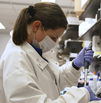 A photo of a scientist in a lab.