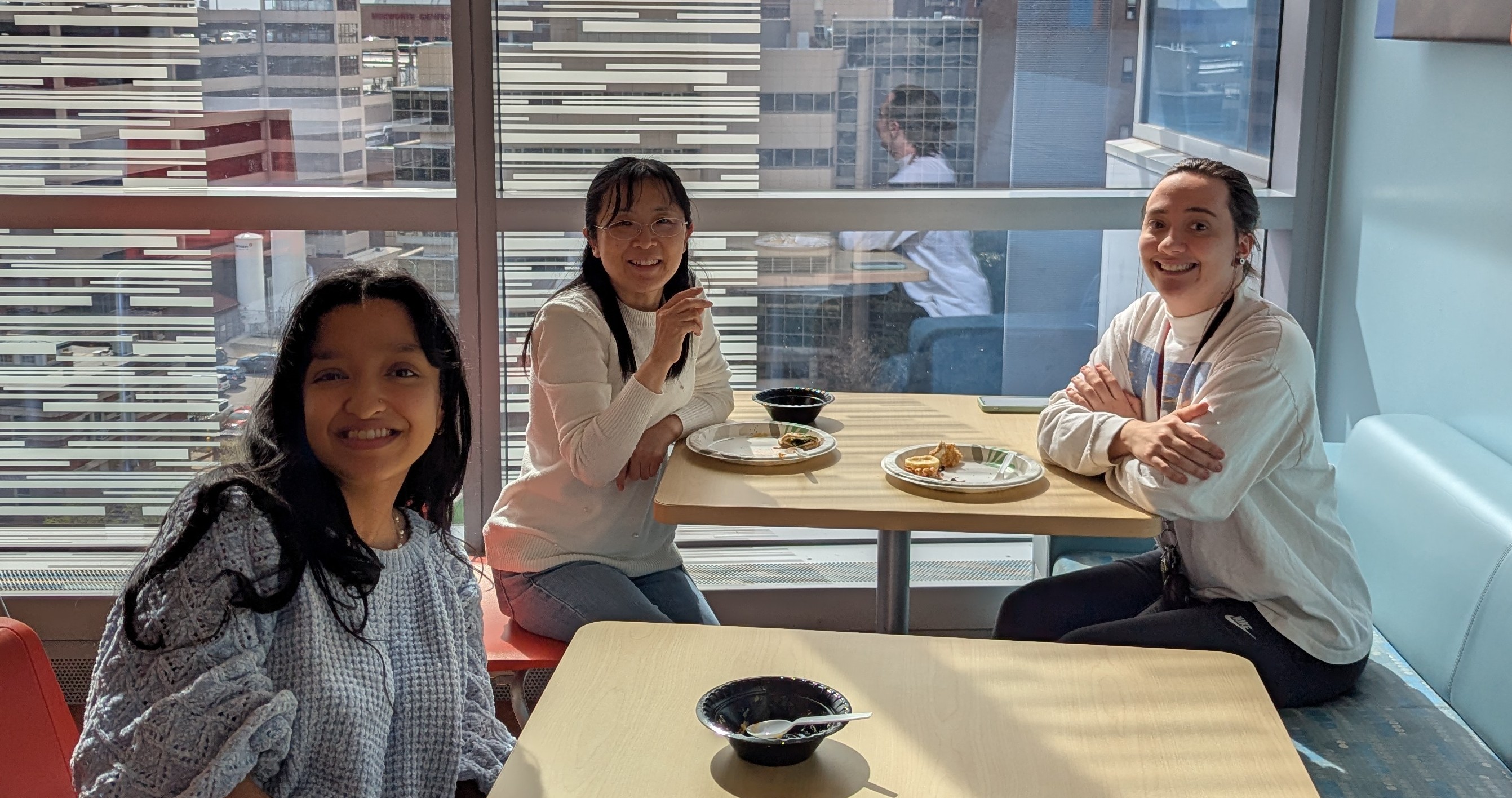 Members of the Panganiban lab enjoy a meal.