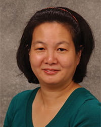 Susan Koh's headshot.