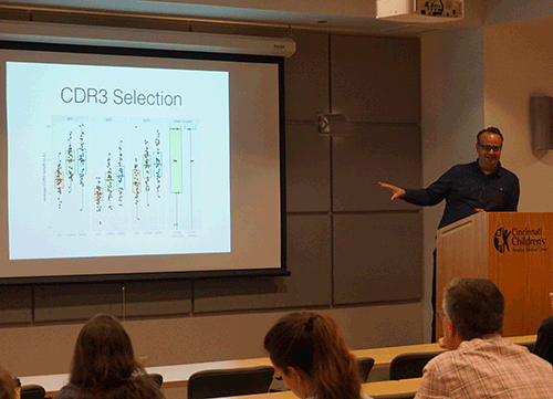 Krishna Rosking, PhD lectures graduate students.